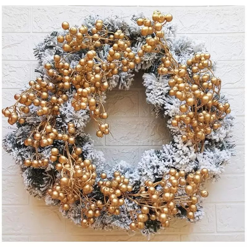 GHIRLANDA NATALIZIA INNEVATA CON BACCHE ORO