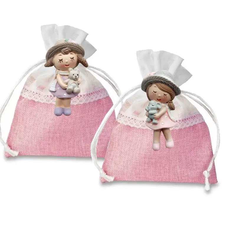 12 Bomboniere magnete bimba con sacchetto rosa